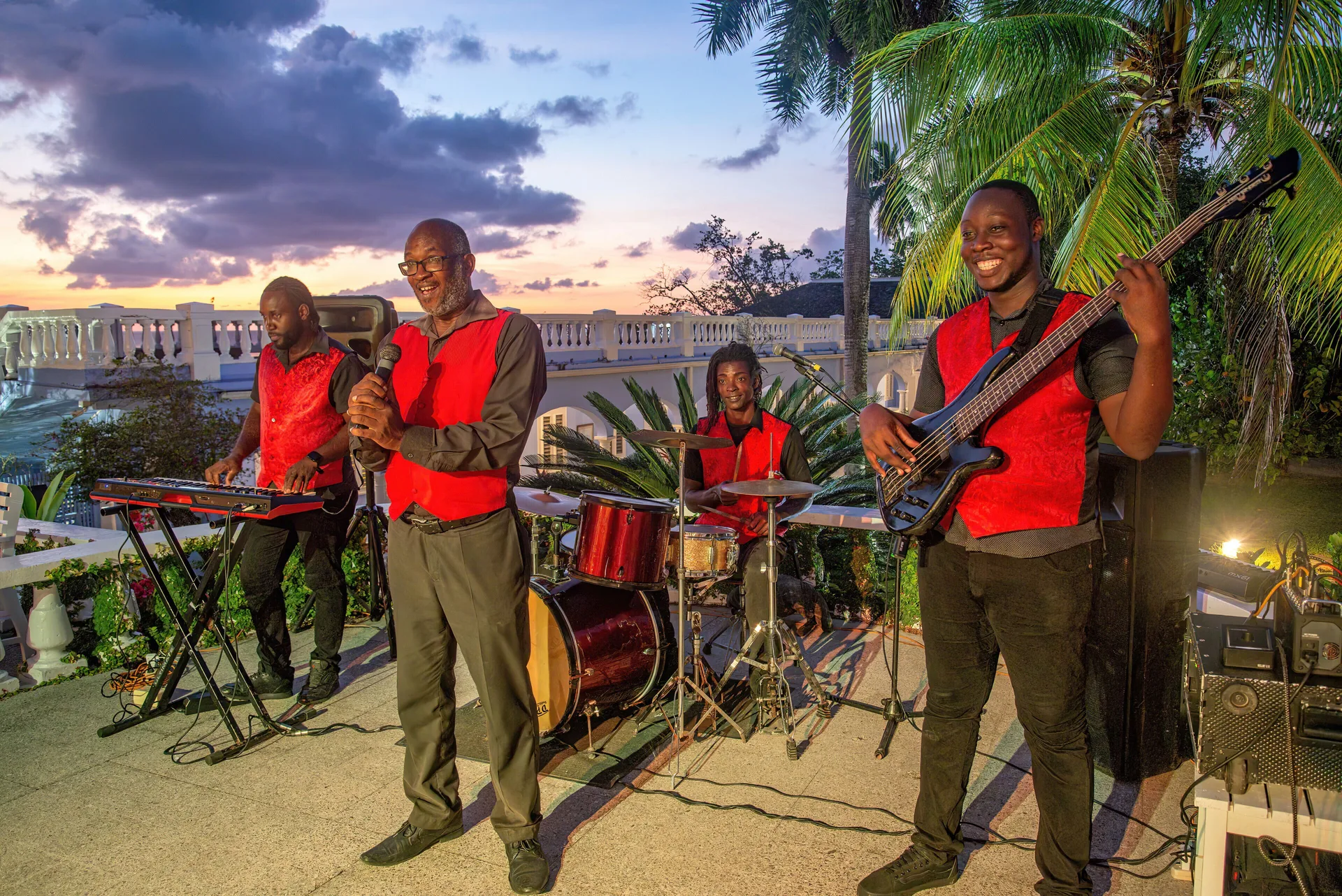 Live band performs on an outdoor terrace at sunset at Jamaica Inn.
