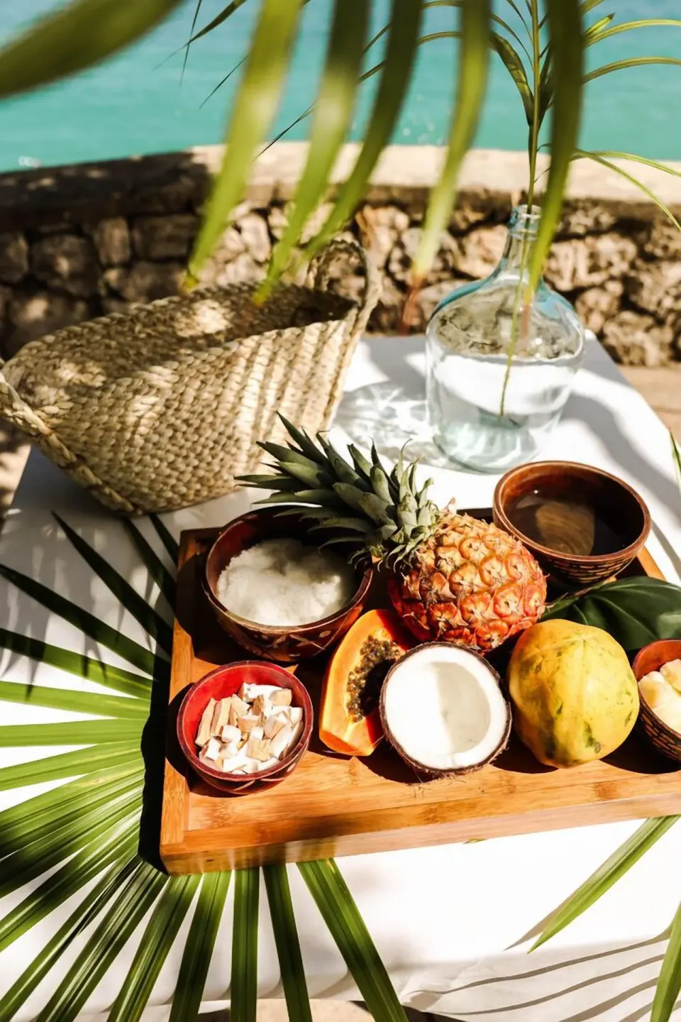 Tropical fruit and coconut display on a tray by the water at Jamaica Inn.