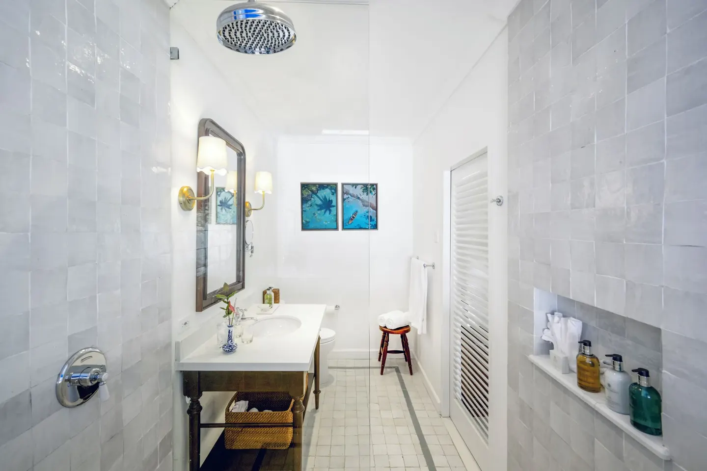 Premier Suite bathroom with tiled shower and vanity at Jamaica Inn.