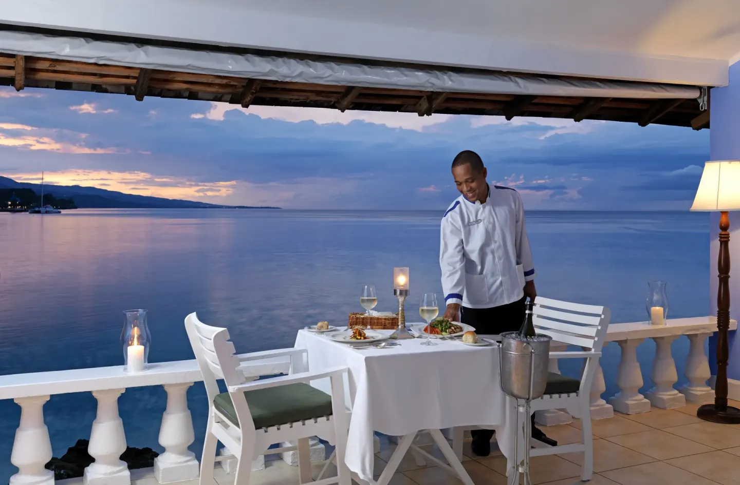 Private dinner on a Premier Suite verandah overlooking the sea at Jamaica Inn.