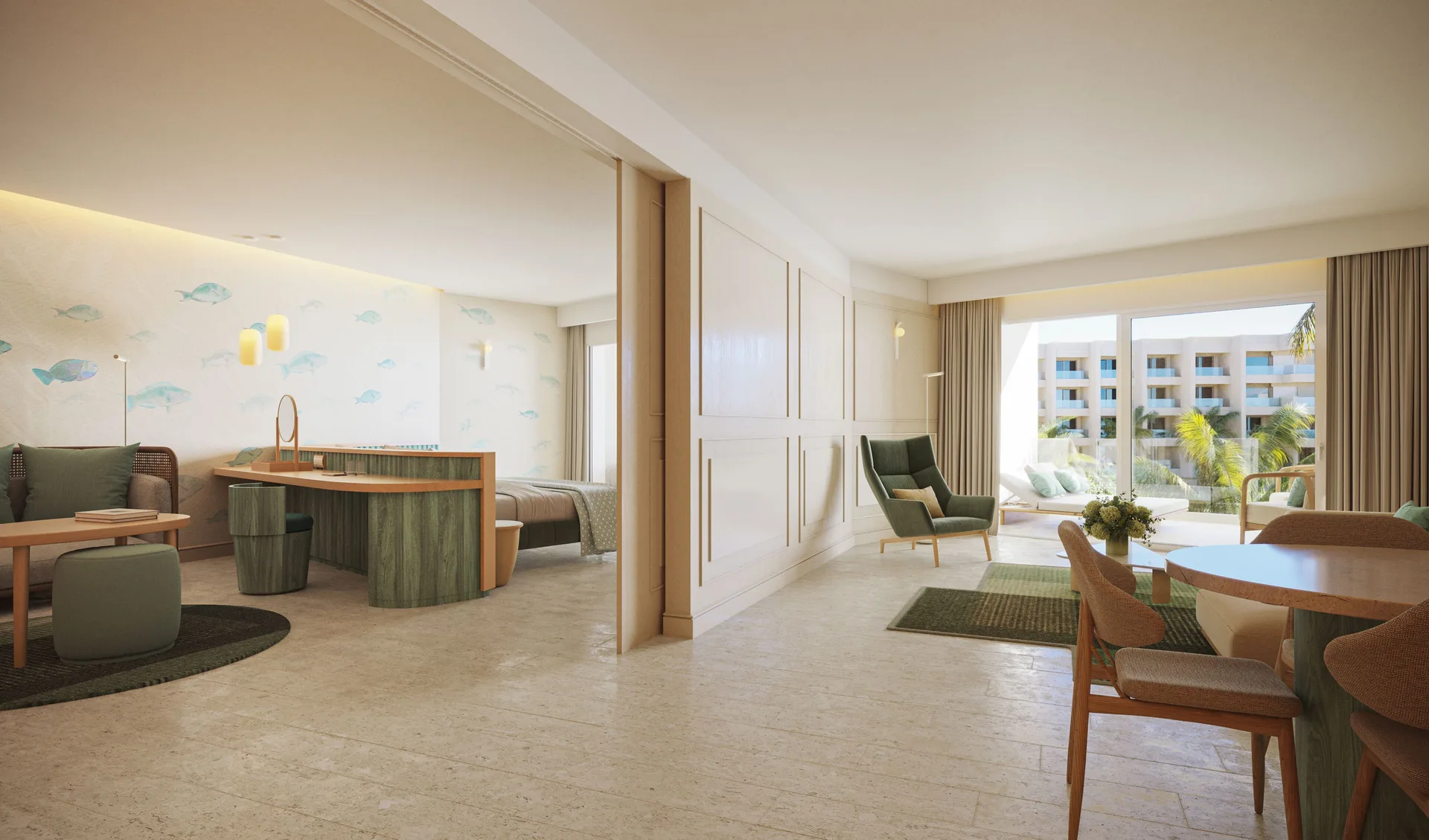 Royal Suite Oceanfront living and bedroom areas at JOIA Aruba with dining table and balcony light.