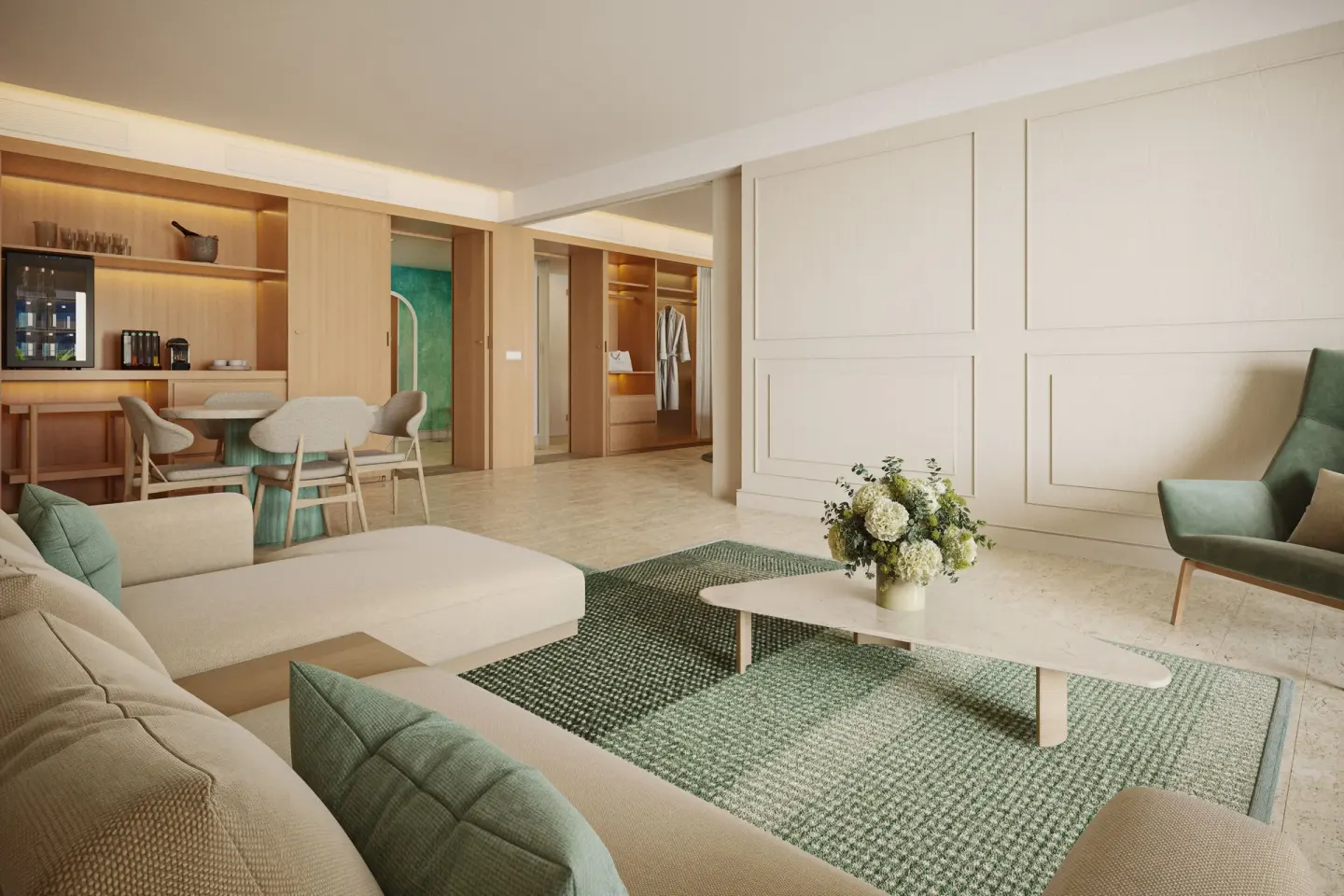 Master Butler Suite living and dining area with sofa, table, and lounge chair at JOIA Aruba.