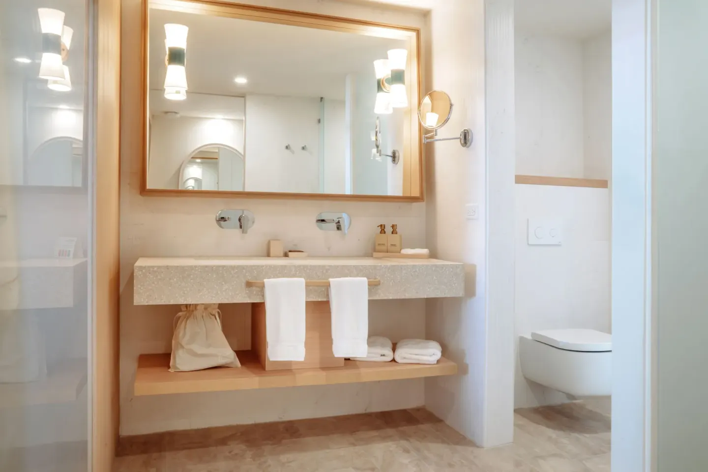 Suite Pool View bathroom vanity with double faucets at JOIA Aruba.