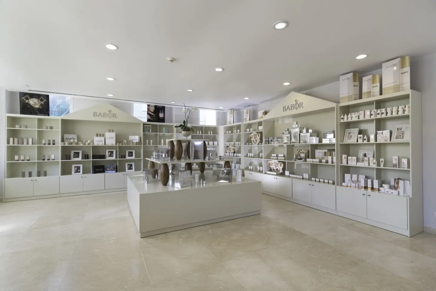 Bright spa retail shelves with skincare displays at JOIA Bávaro by Iberostar.