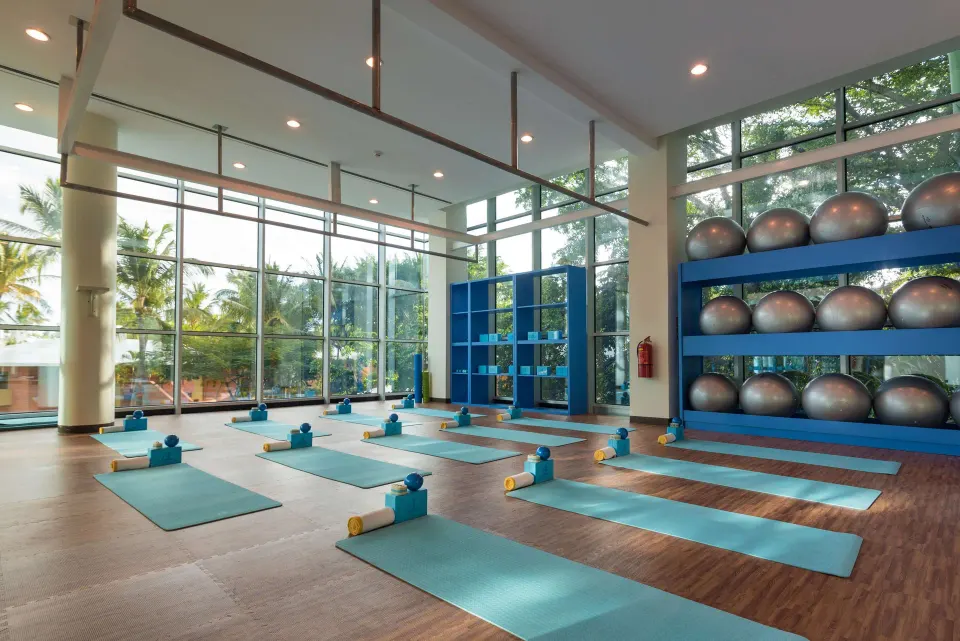 Yoga studio with mats, props, and exercise balls at JOIA Bávaro by Iberostar.