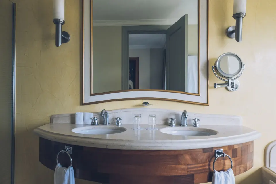 Ocean View Suite double vanity with mirror at JOIA Bávaro by Iberostar.