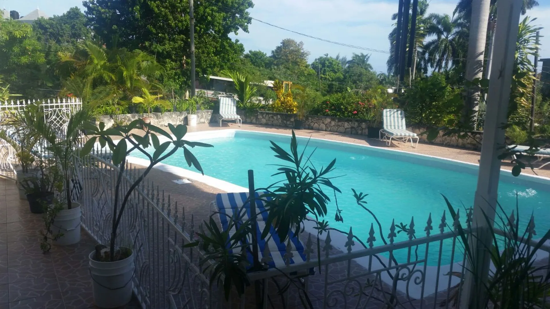 Holiday House Second floor Ste Montego Bay vacation suite with apartment-style comfort and local setting