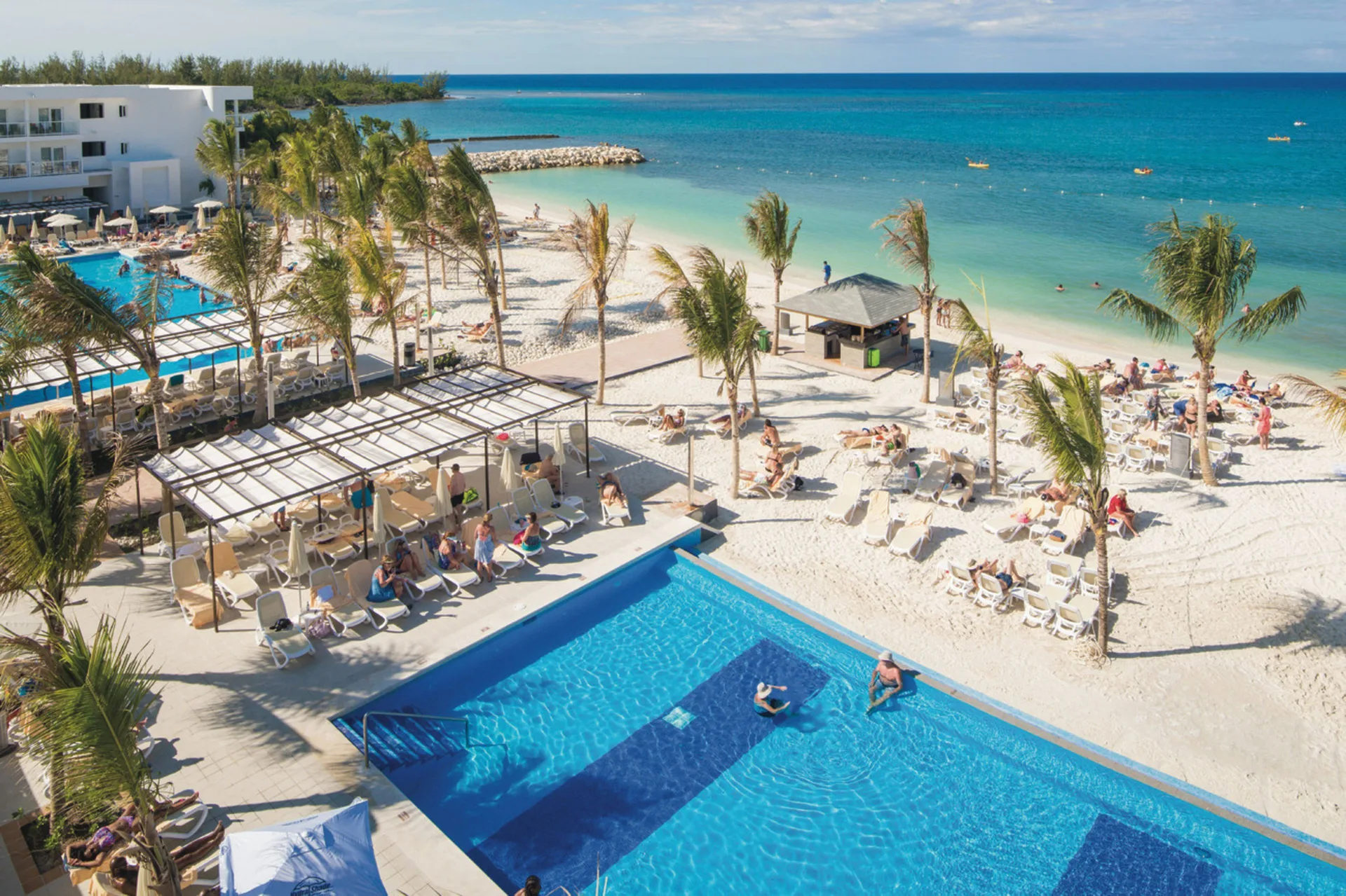 Hotel Riu Reggae adults-only all-inclusive resort in Montego Bay, Jamaica with oceanfront pools and lively entertainment.