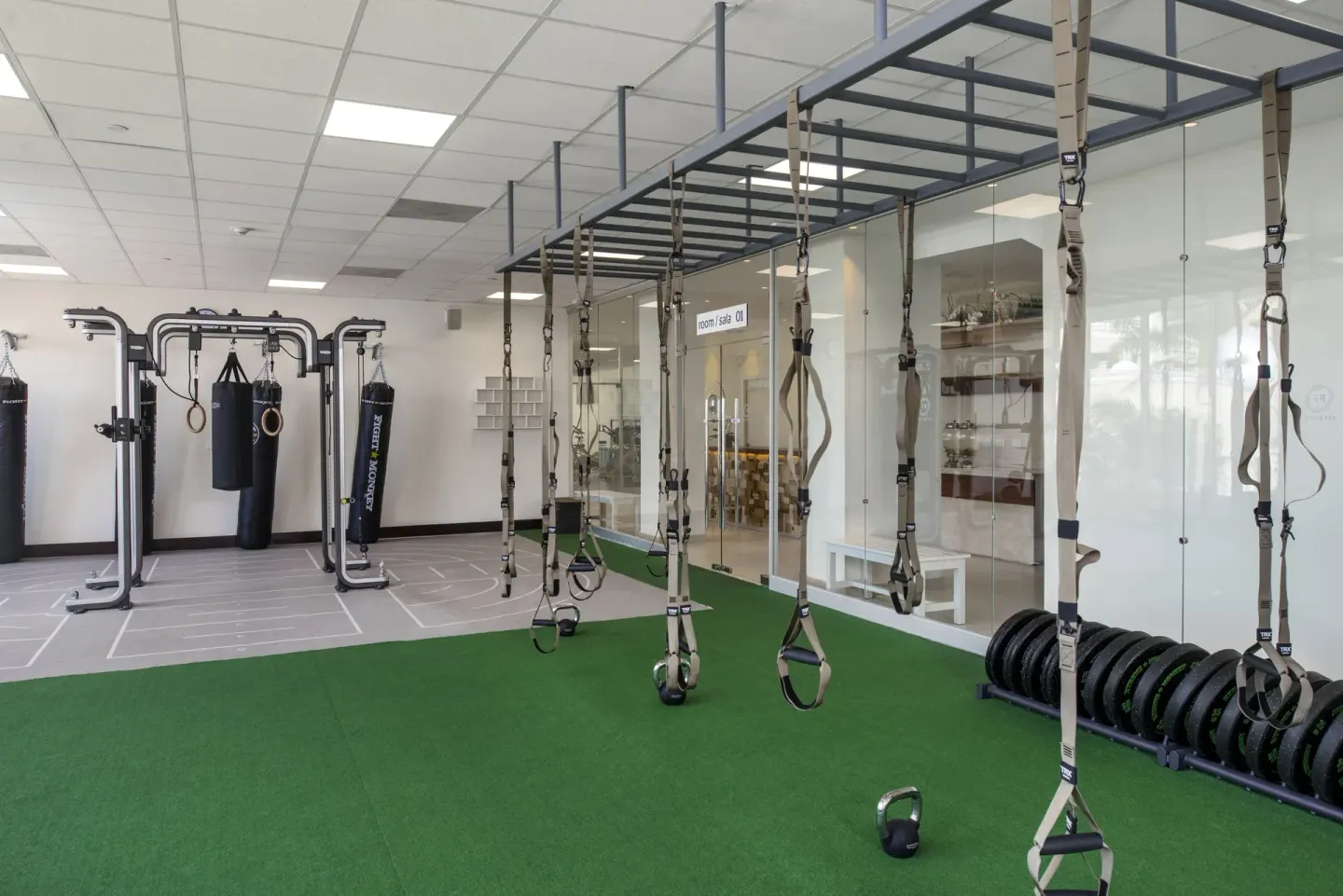 Functional training area with suspension straps and punching bags at JOIA Rose Hall by Iberostar.