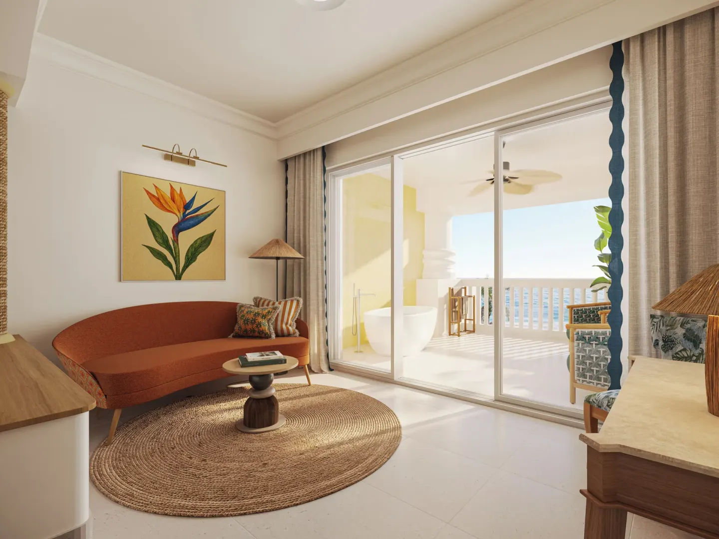 Oceanfront suite sitting area and balcony jacuzzi at JOIA Rose Hall by Iberostar.