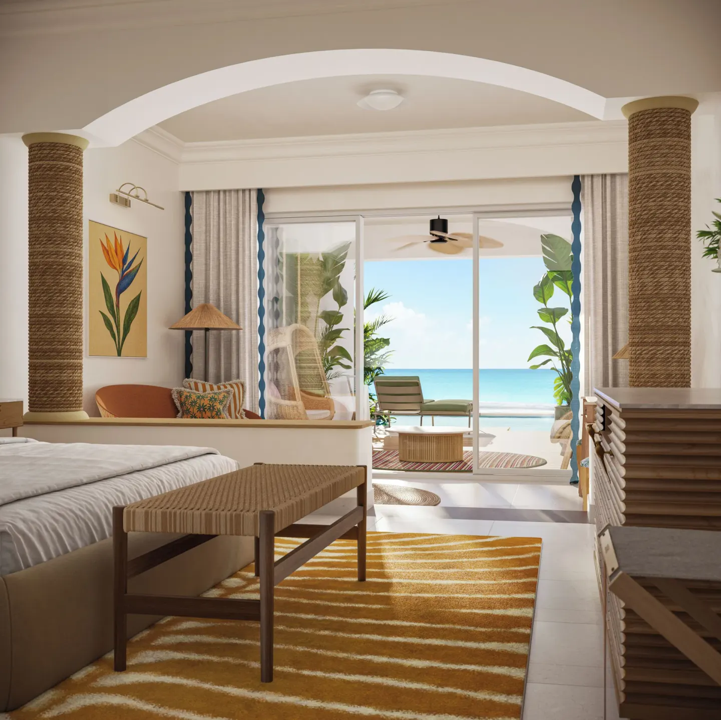 Oceanfront swim-out suite bedroom with king bed and terrace at JOIA Rose Hall by Iberostar.