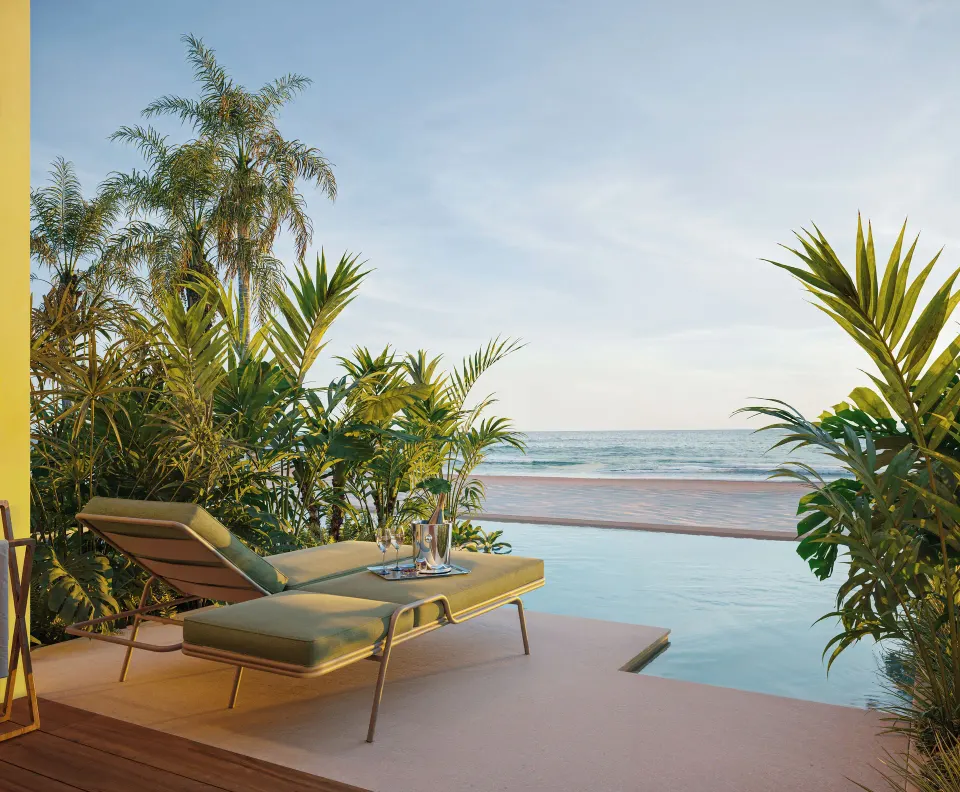 Oceanfront swim-out terrace with lounger and plunge pool at JOIA Rose Hall by Iberostar.