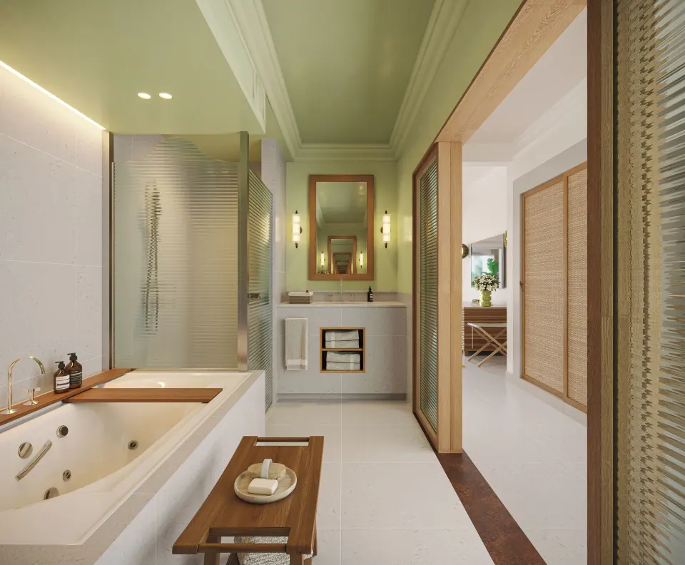 Suite bathroom with tub, shower, and vanity at JOIA Rose Hall by Iberostar.