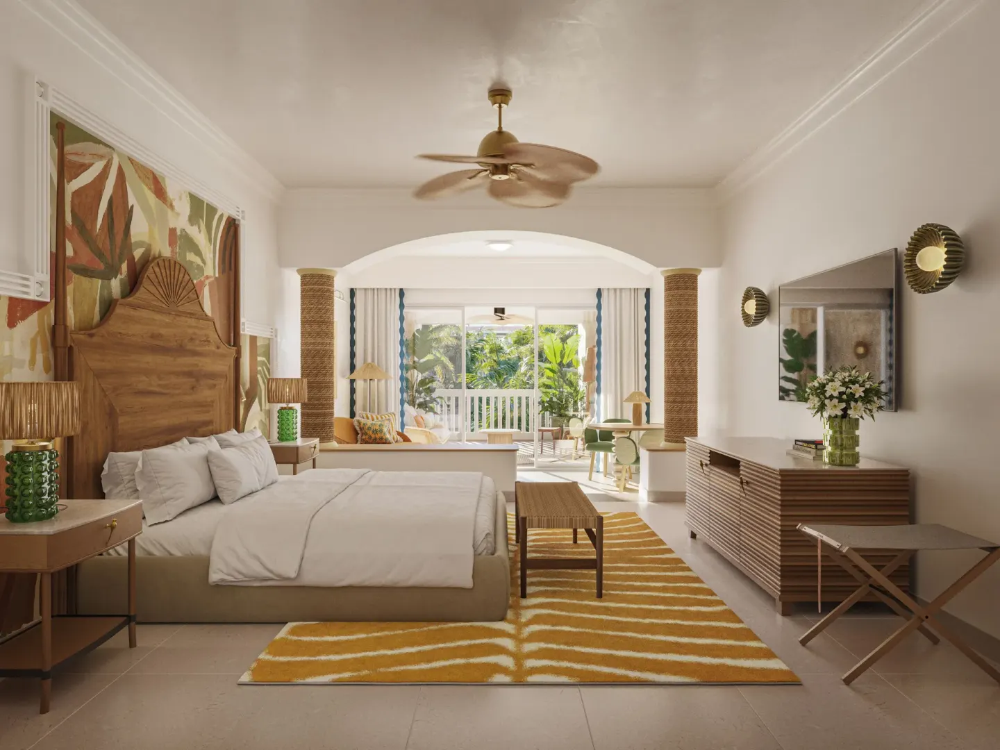 King-bed suite with sitting area and balcony at JOIA Rose Hall by Iberostar.