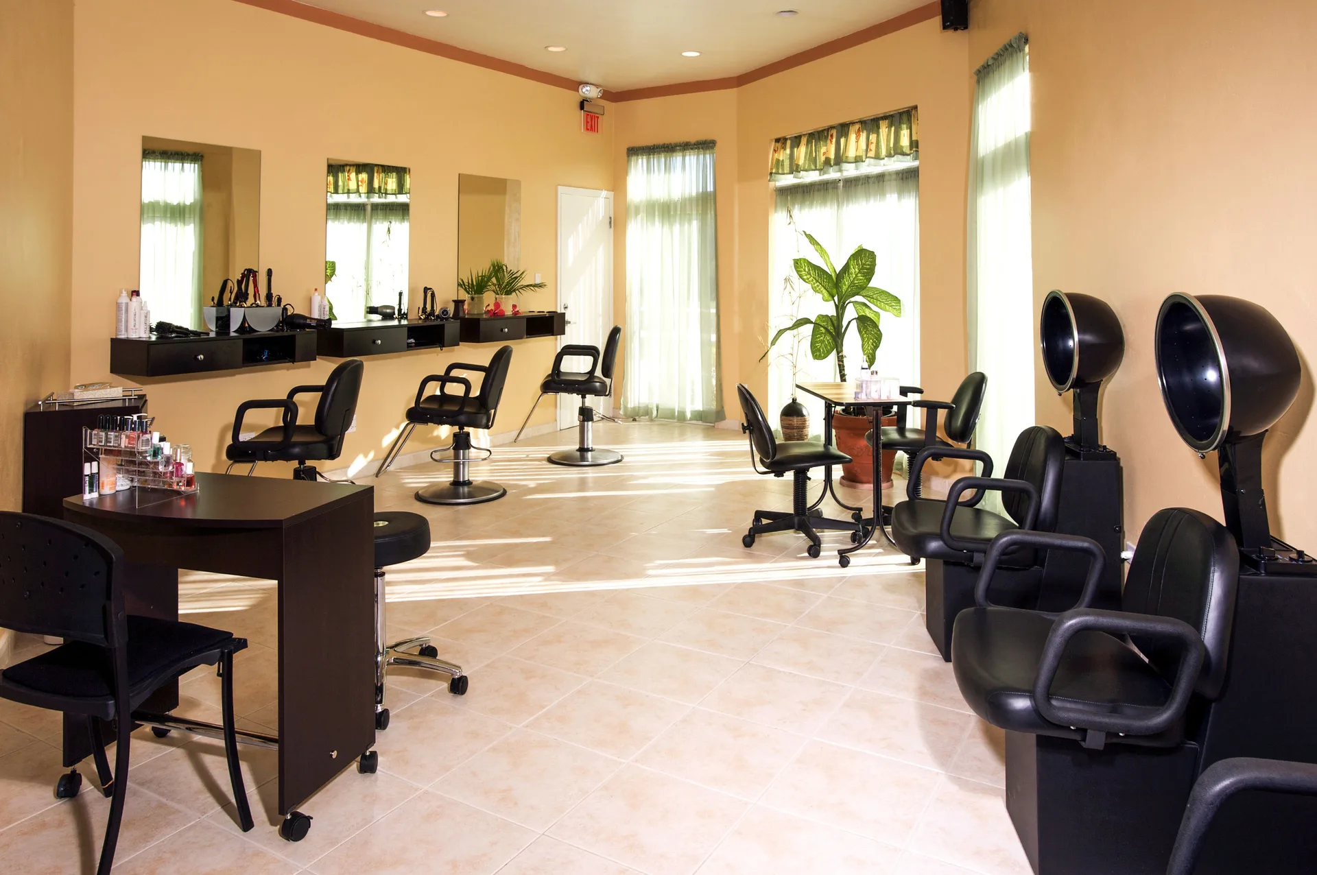 Salon with styling stations and hair dryers at Jolly Beach Antigua.