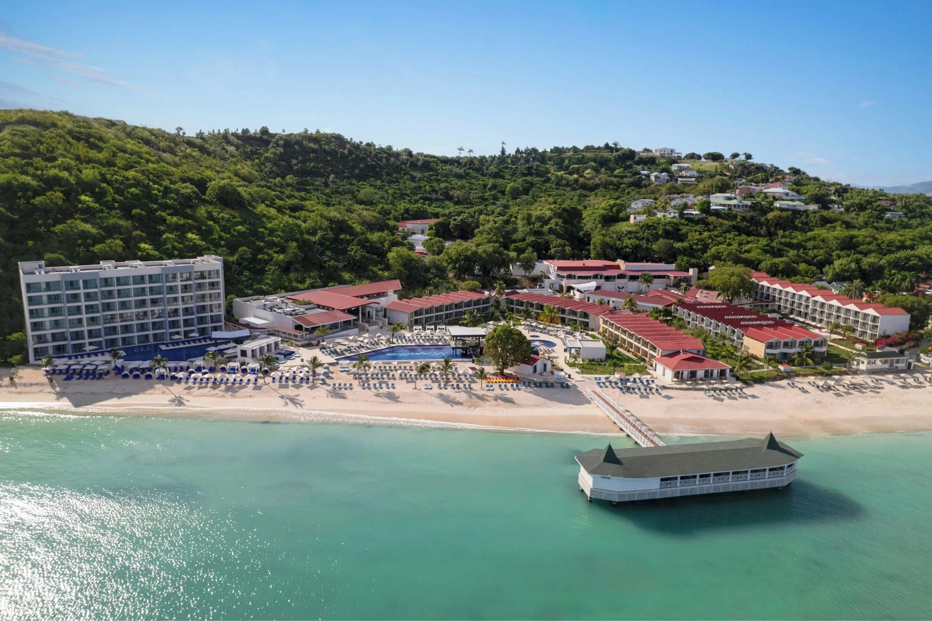 Royalton CHIC Antigua adults-only all-inclusive resort with stylish design and social beachfront scene