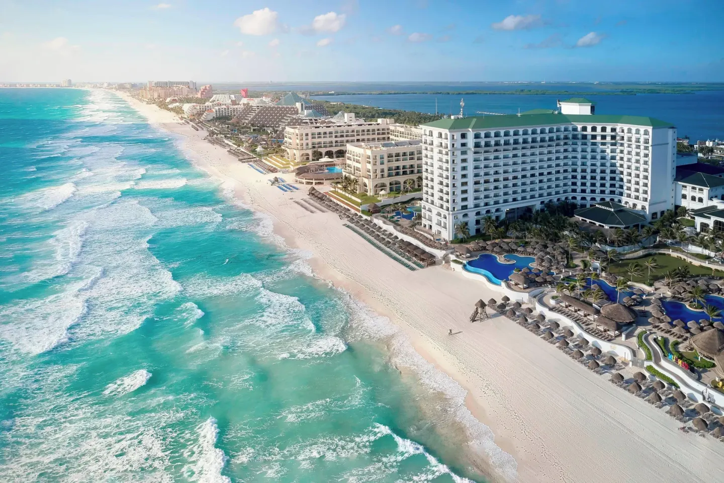 Aerial beachfront view of the resort and pools at JW Marriott Cancun Resort & Spa.