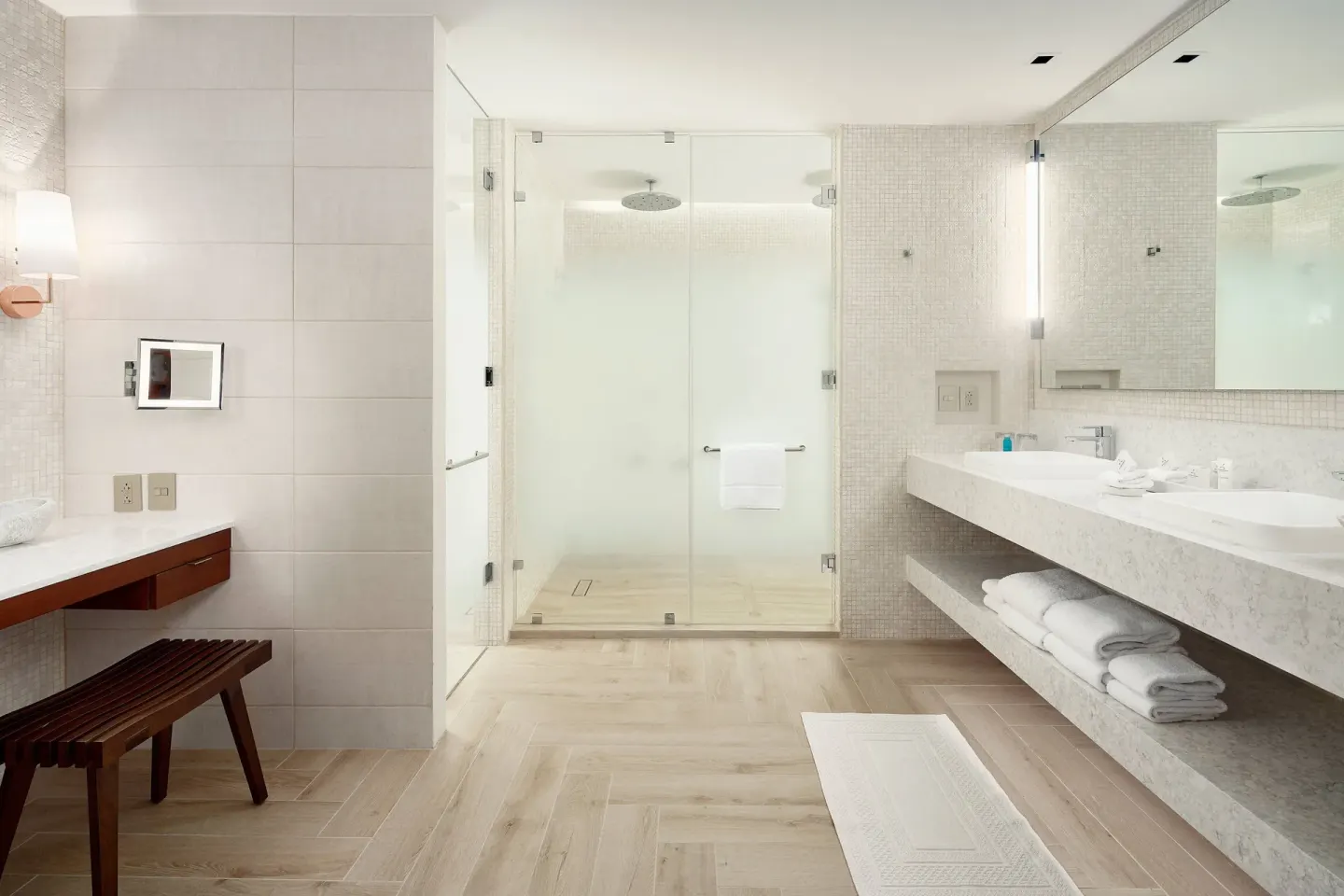 Presidential Suite bathroom with double vanity and glass shower at JW Marriott Cancun Resort & Spa.