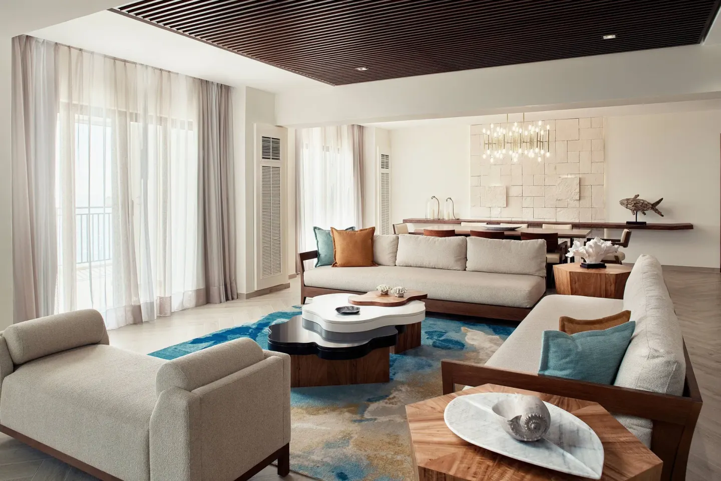 Presidential Suite living room with sofas and balcony light at JW Marriott Cancun Resort & Spa.