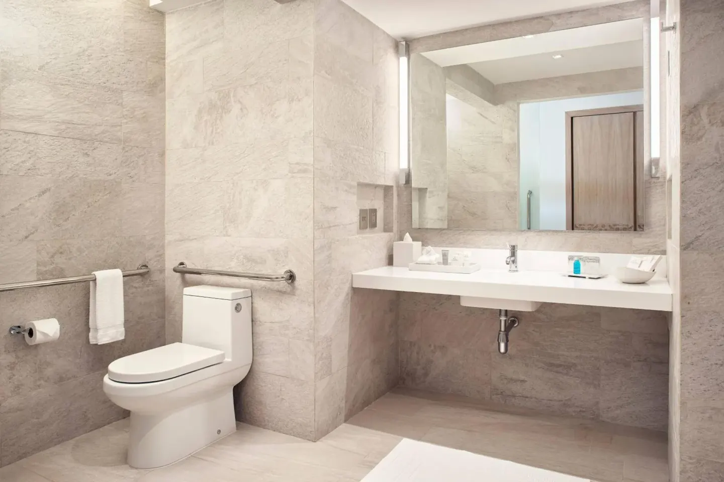 Deluxe Room Ocean View bathroom vanity and toilet at JW Marriott Cancun Resort & Spa.