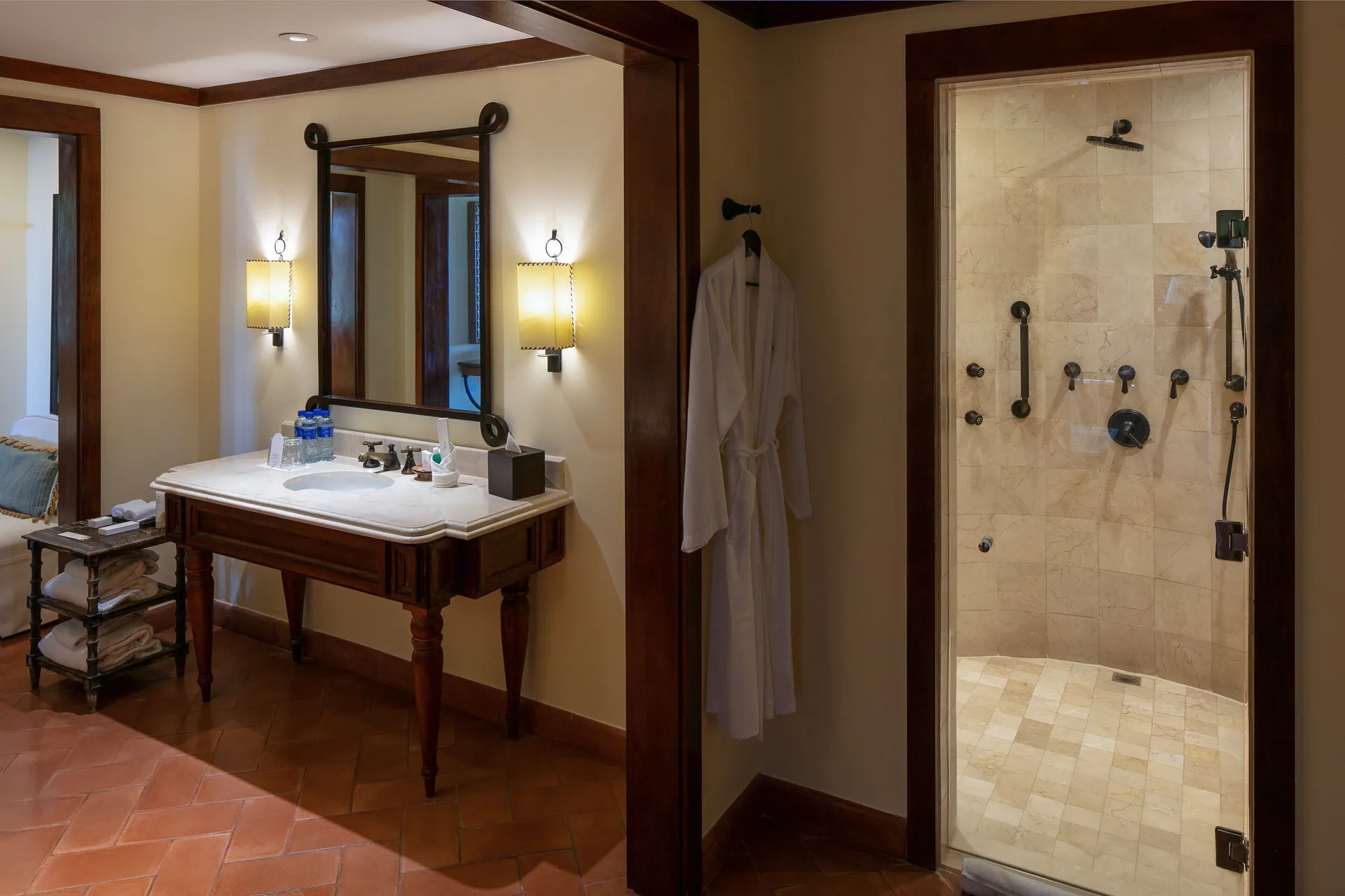 Guest bathroom with vanity and glass shower at JW Marriott Guanacaste Resort and Spa.