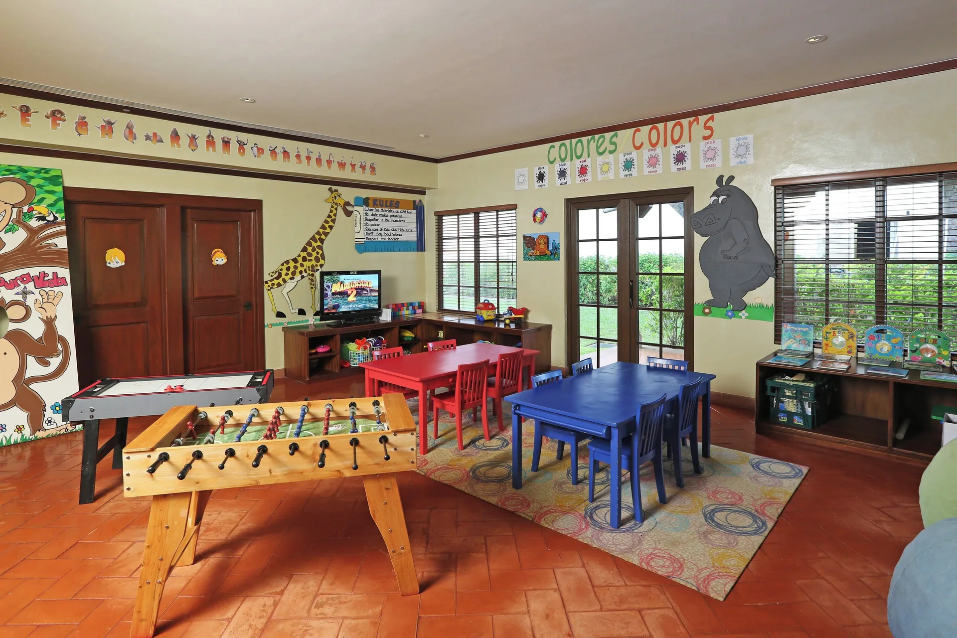 Kids club playroom with games and small tables at JW Marriott Guanacaste Resort and Spa.