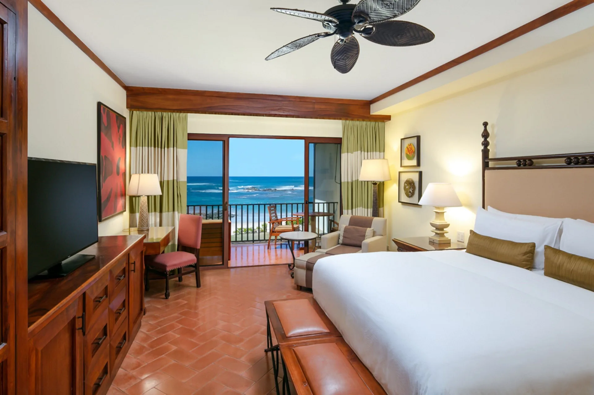 Ocean view guest room with king bed at JW Marriott Guanacaste Resort and Spa.