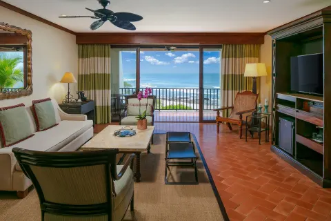 Oceanfront suite living room with balcony at JW Marriott Guanacaste Resort and Spa.