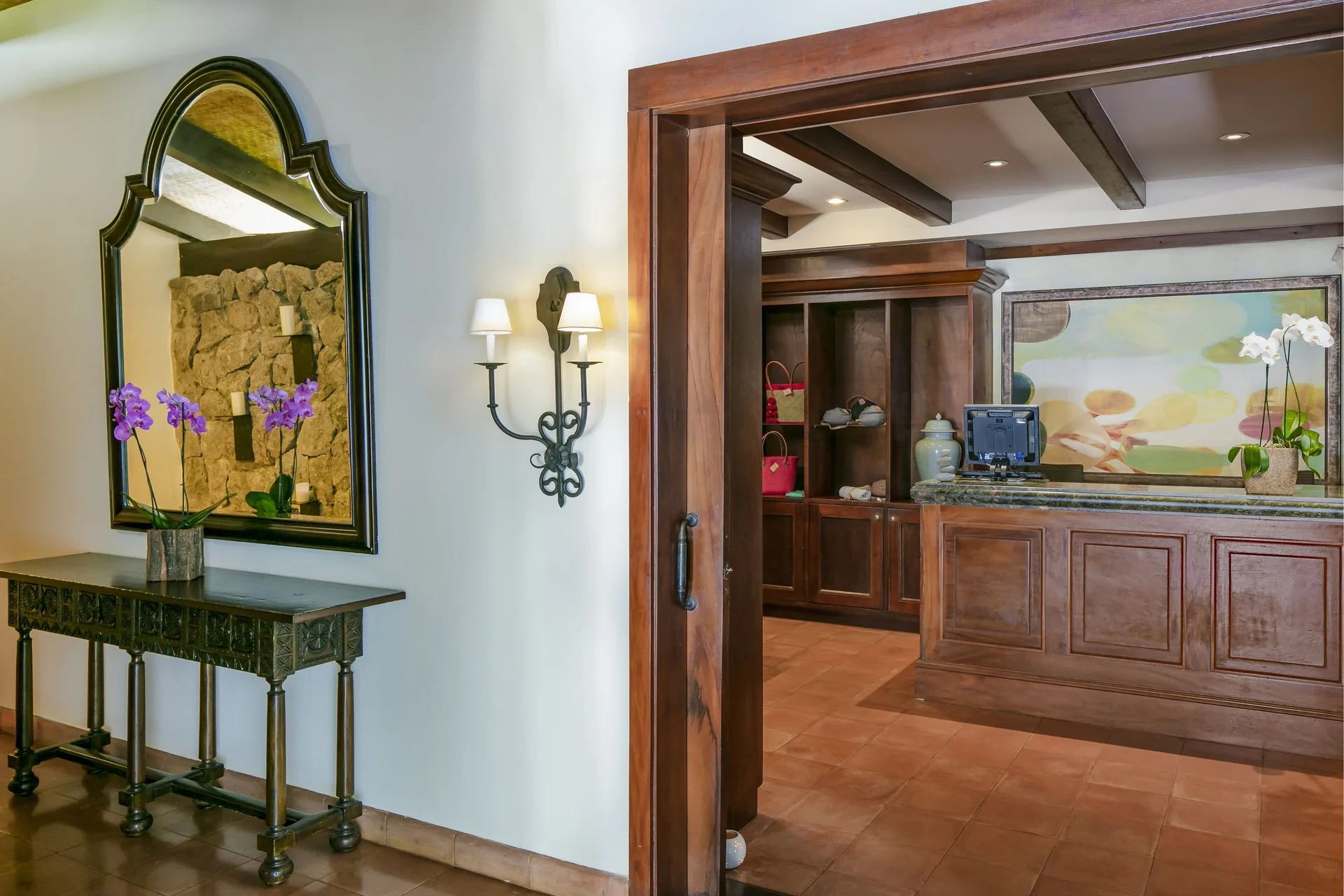 Reception desk and orchid display at JW Marriott Guanacaste Resort and Spa.