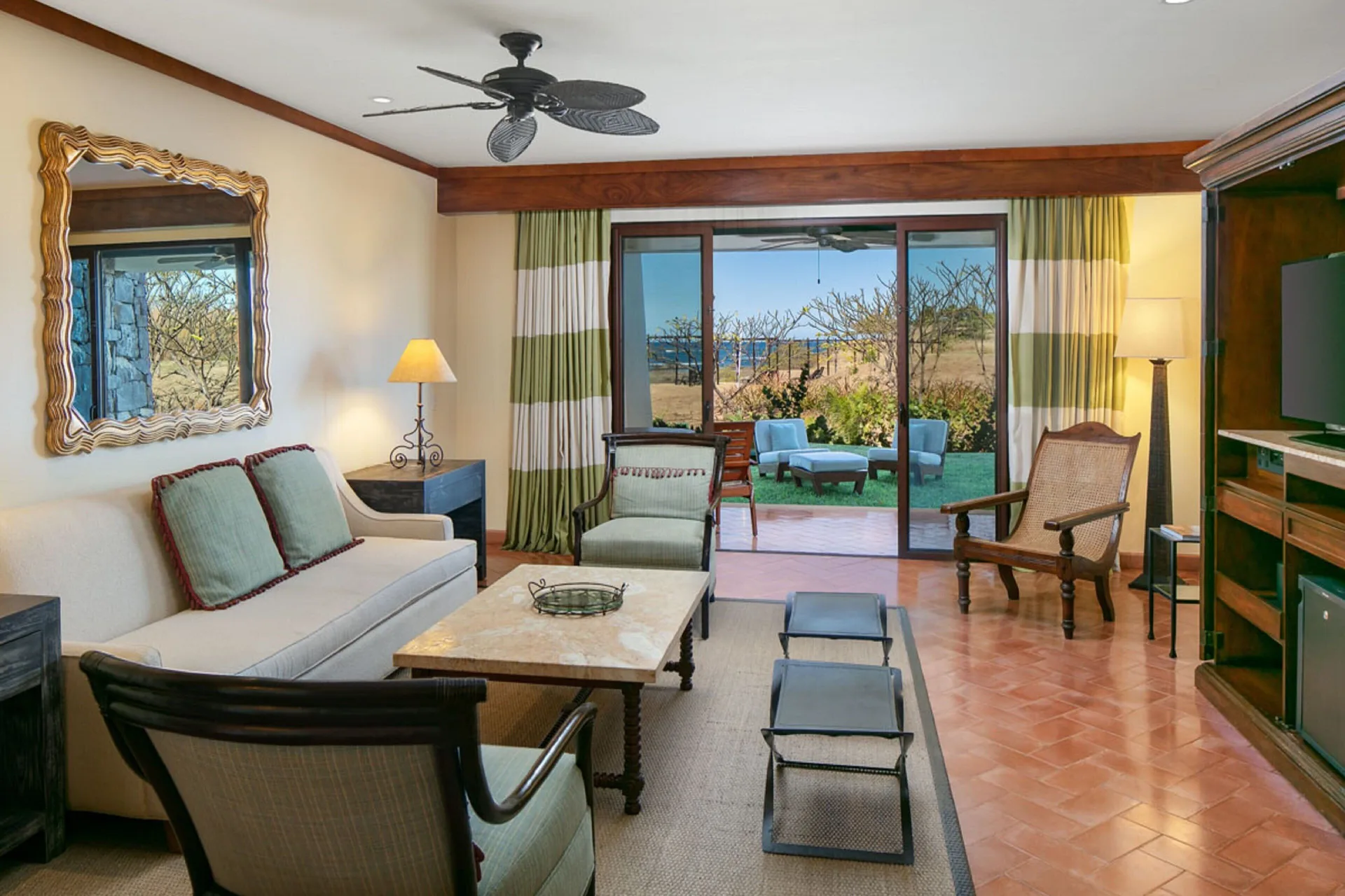 Suite living room with terrace access at JW Marriott Guanacaste Resort and Spa.
