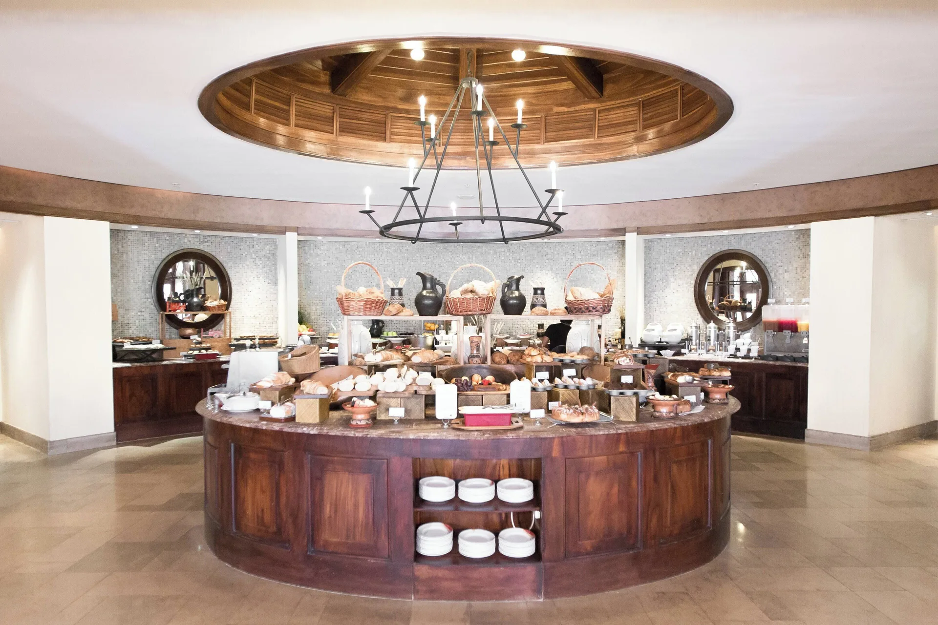 A breakfast buffet with breads and fruit at JW Marriott Guanacaste Resort and Spa.