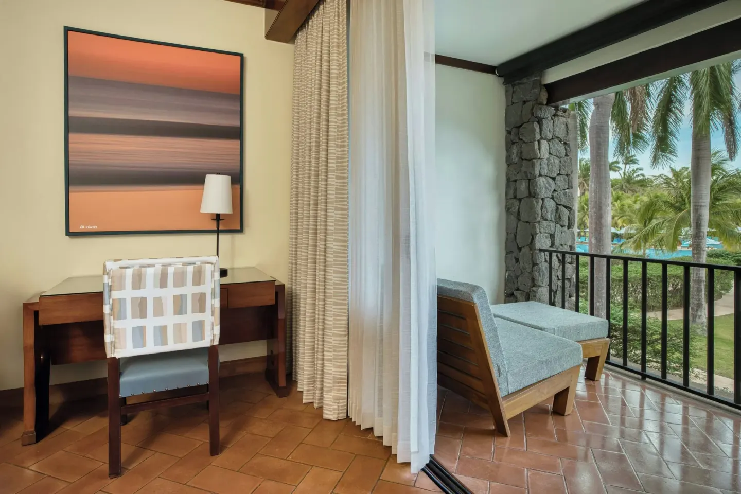 Deluxe Room Balcony desk and covered balcony at JW Marriott Guanacaste Resort and Spa.