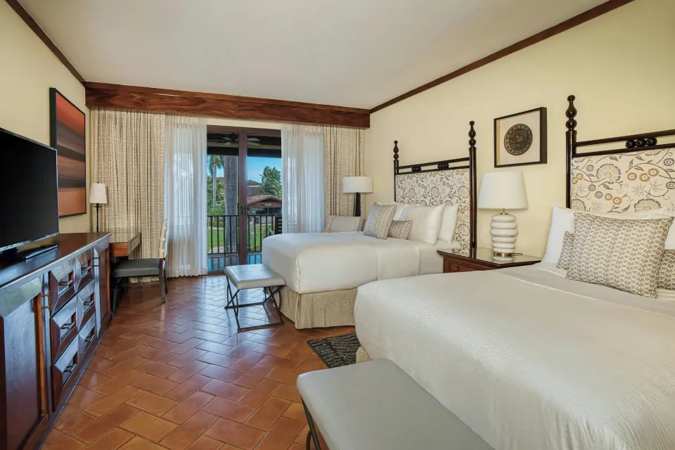 Deluxe Room with two beds and balcony doors at JW Marriott Guanacaste Resort and Spa.
