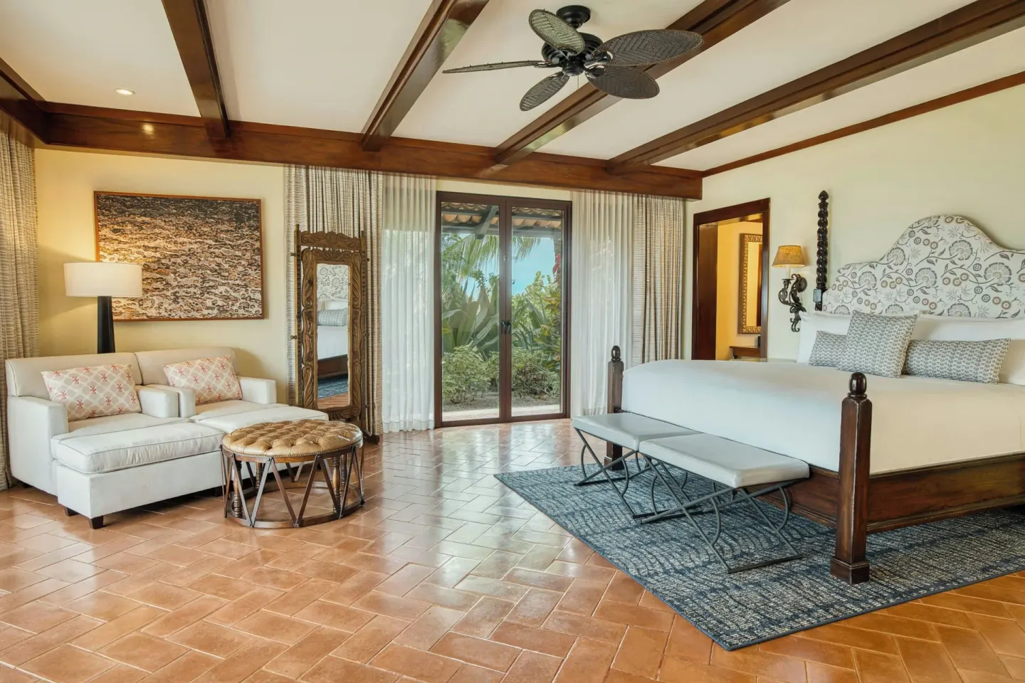 Presidential Suite king bedroom with garden doors at JW Marriott Guanacaste Resort and Spa.
