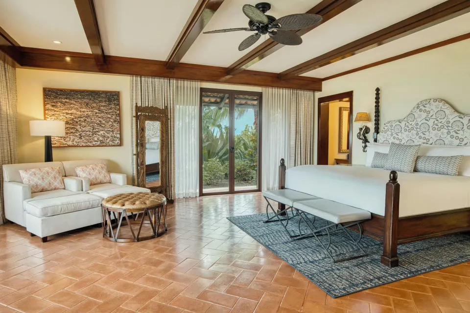 Presidential Suite king bedroom with garden doors at JW Marriott Guanacaste Resort and Spa.