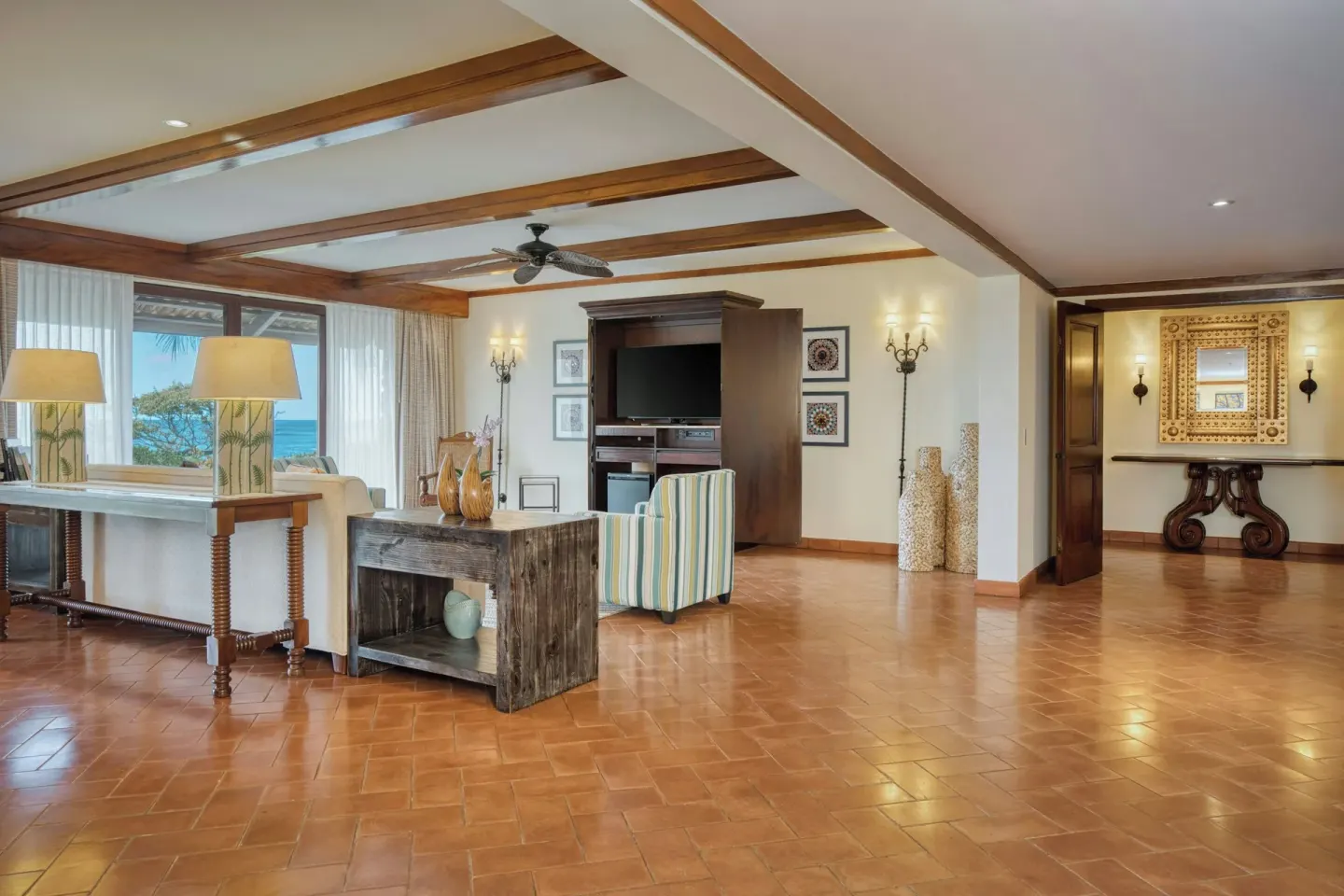 Presidential Suite living area with ocean-facing windows at JW Marriott Guanacaste Resort and Spa.