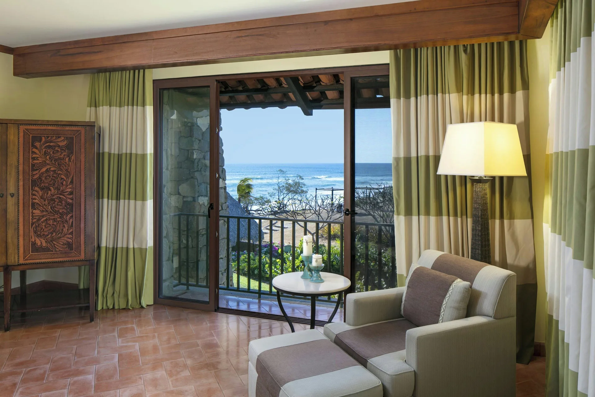 Oceanfront suite sitting area with balcony at JW Marriott Guanacaste Resort and Spa.
