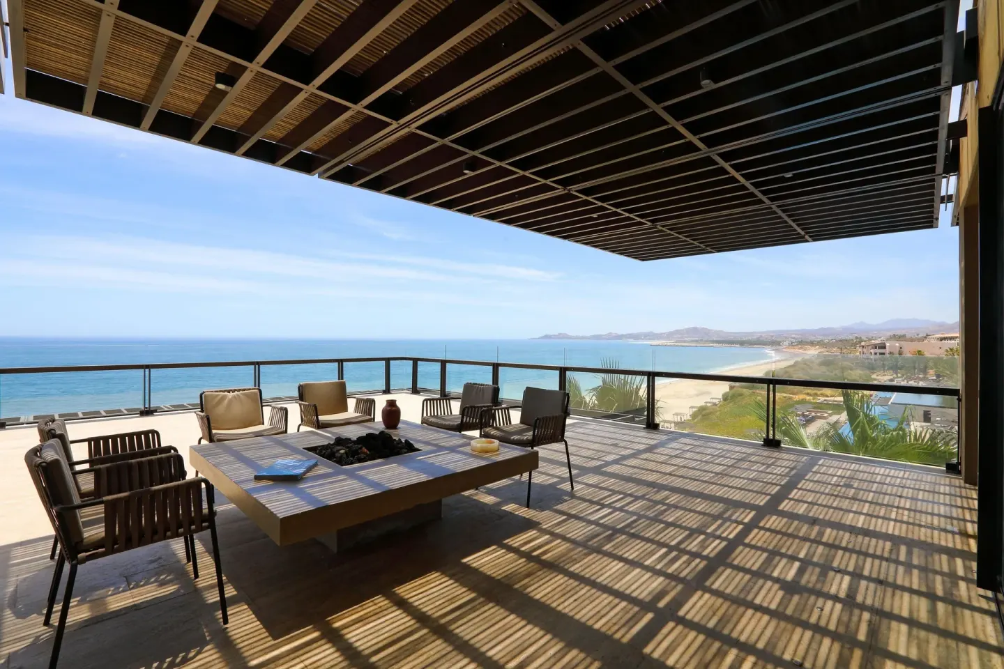 Covered ocean-view terrace seating at JW Marriott Los Cabos Beach Resort & Spa.
