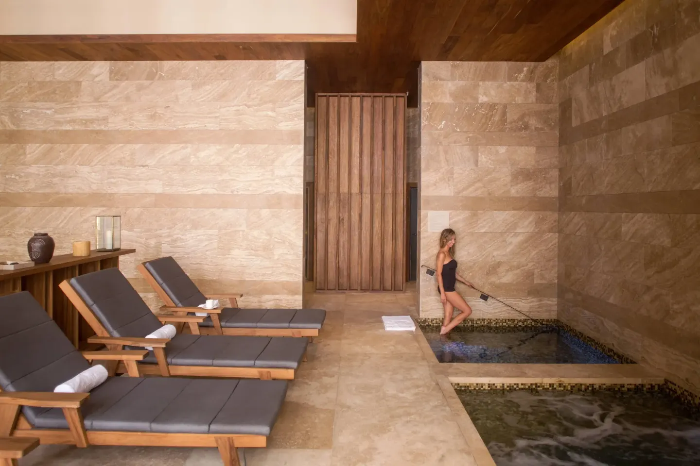Indoor spa plunge pools and loungers at JW Marriott Los Cabos Beach Resort & Spa.