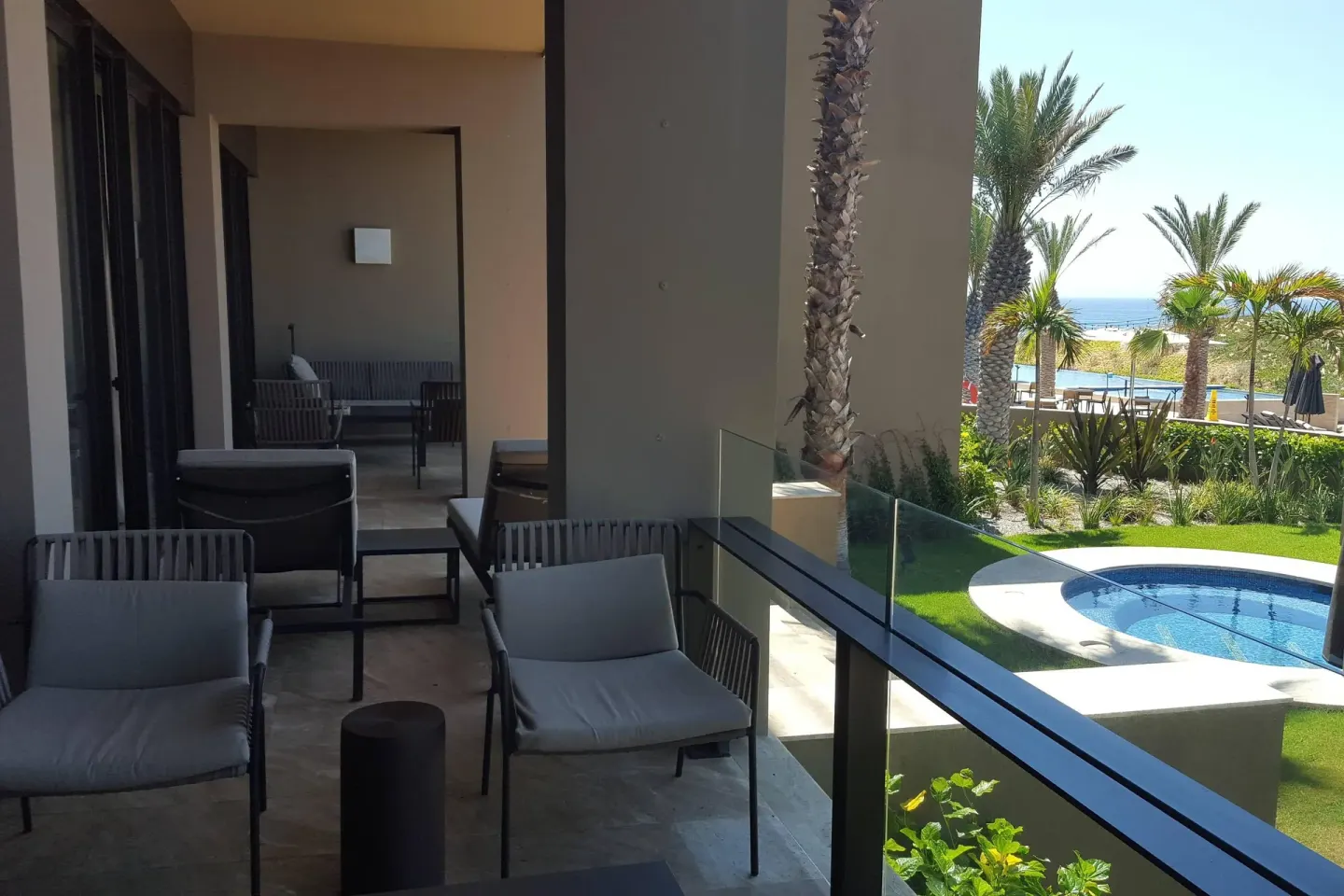 Shaded terrace seating beside a plunge pool at JW Marriott Los Cabos Beach Resort & Spa.