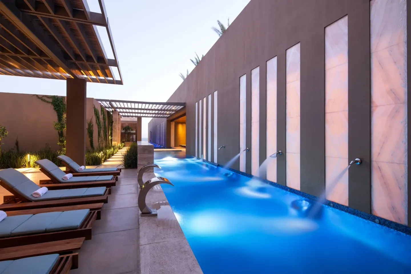 Narrow spa pool with wall water features at JW Marriott Los Cabos Beach Resort & Spa.