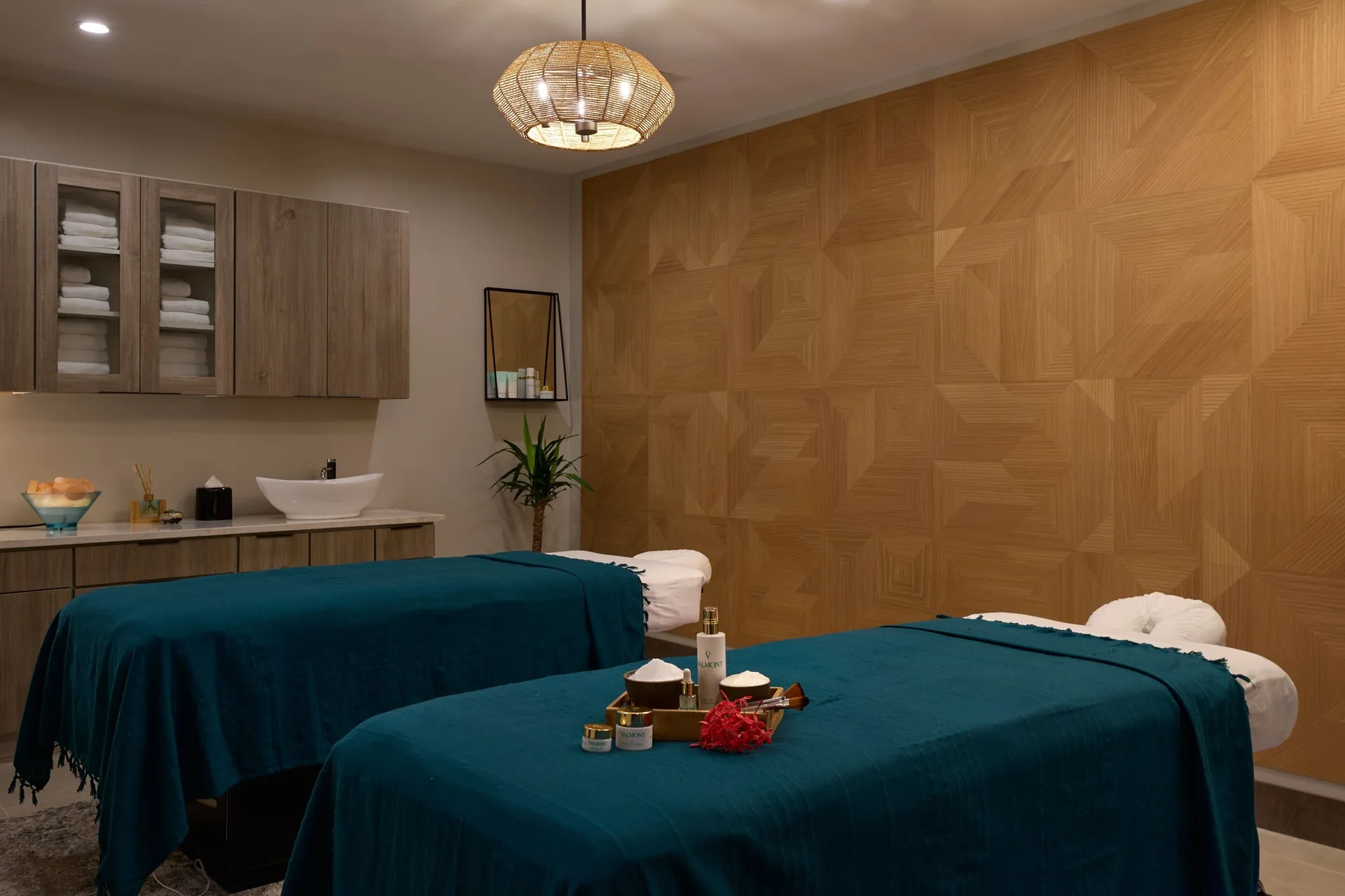 Two teal-covered spa treatment tables at JW Marriott St. Maarten Beach Resort & Spa.