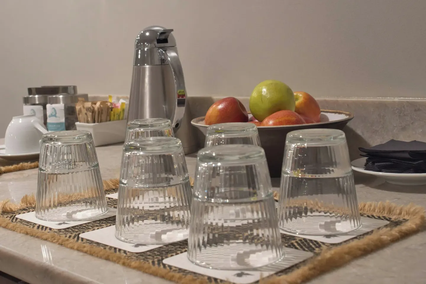 Glasses, fruit, and refreshments on a spa counter at JW Marriott St. Maarten Beach Resort & Spa.