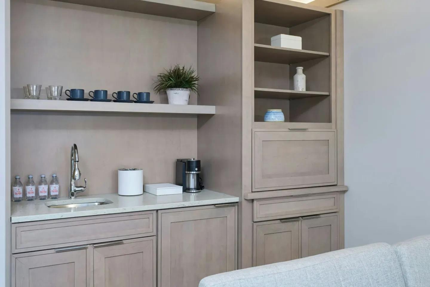 Suite wet bar with sink, coffee maker, cups, and shelving at JW Marriott St. Maarten Beach Resort & Spa.