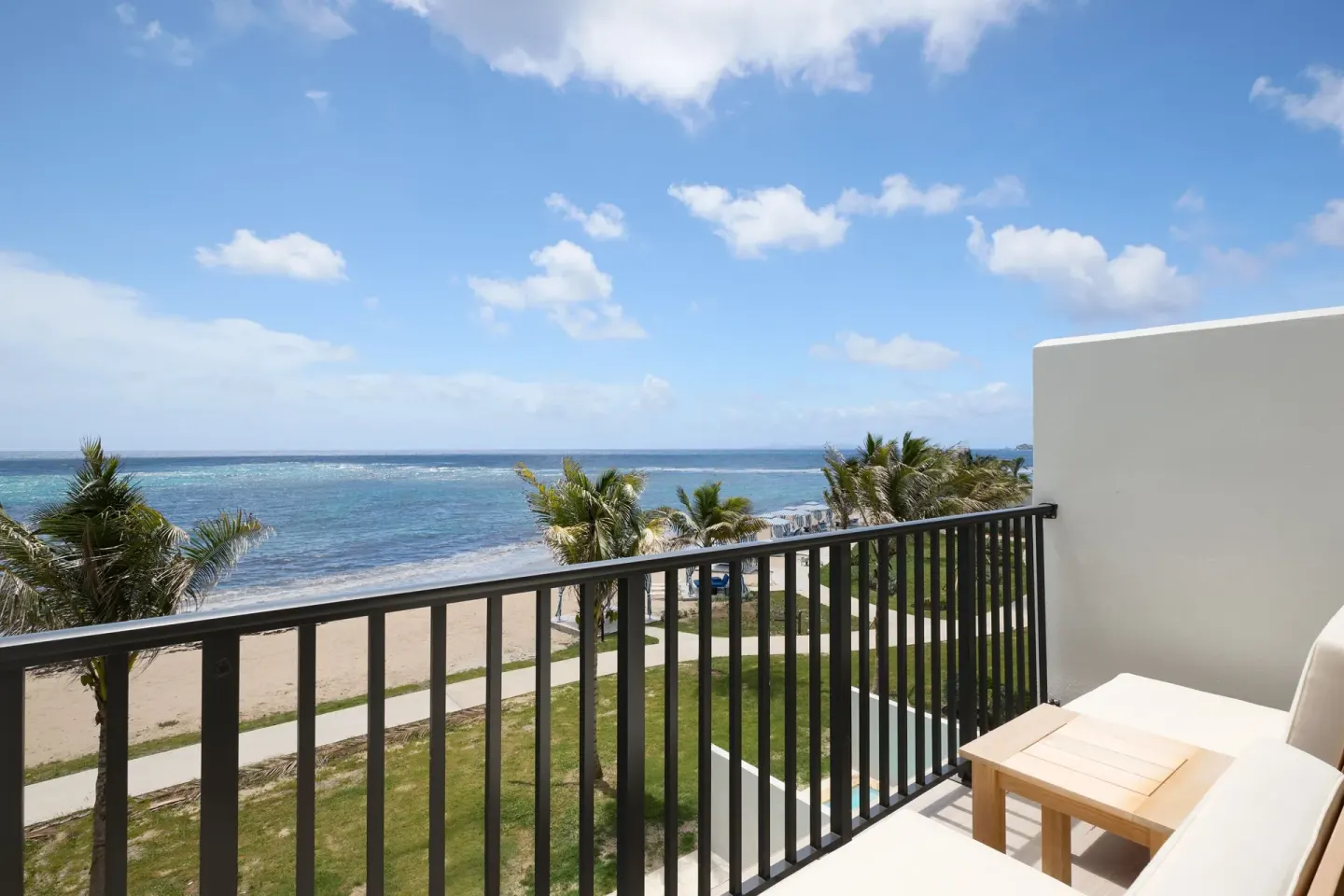 Oceanfront balcony view from JW Marriott St. Maarten Beach Resort & Spa deluxe room.