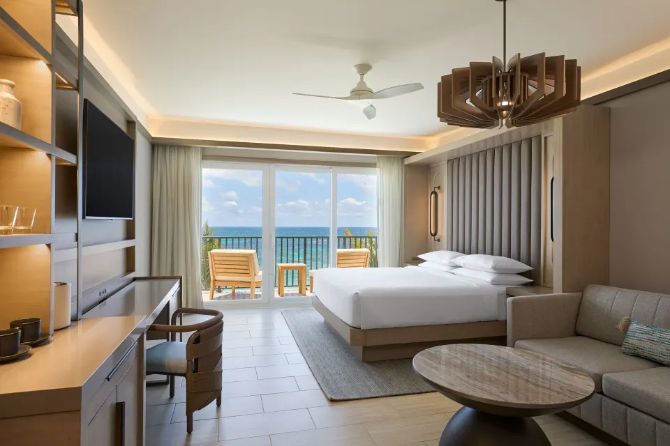 Deluxe oceanfront room with sofa bed and balcony at JW Marriott St. Maarten Beach Resort & Spa.