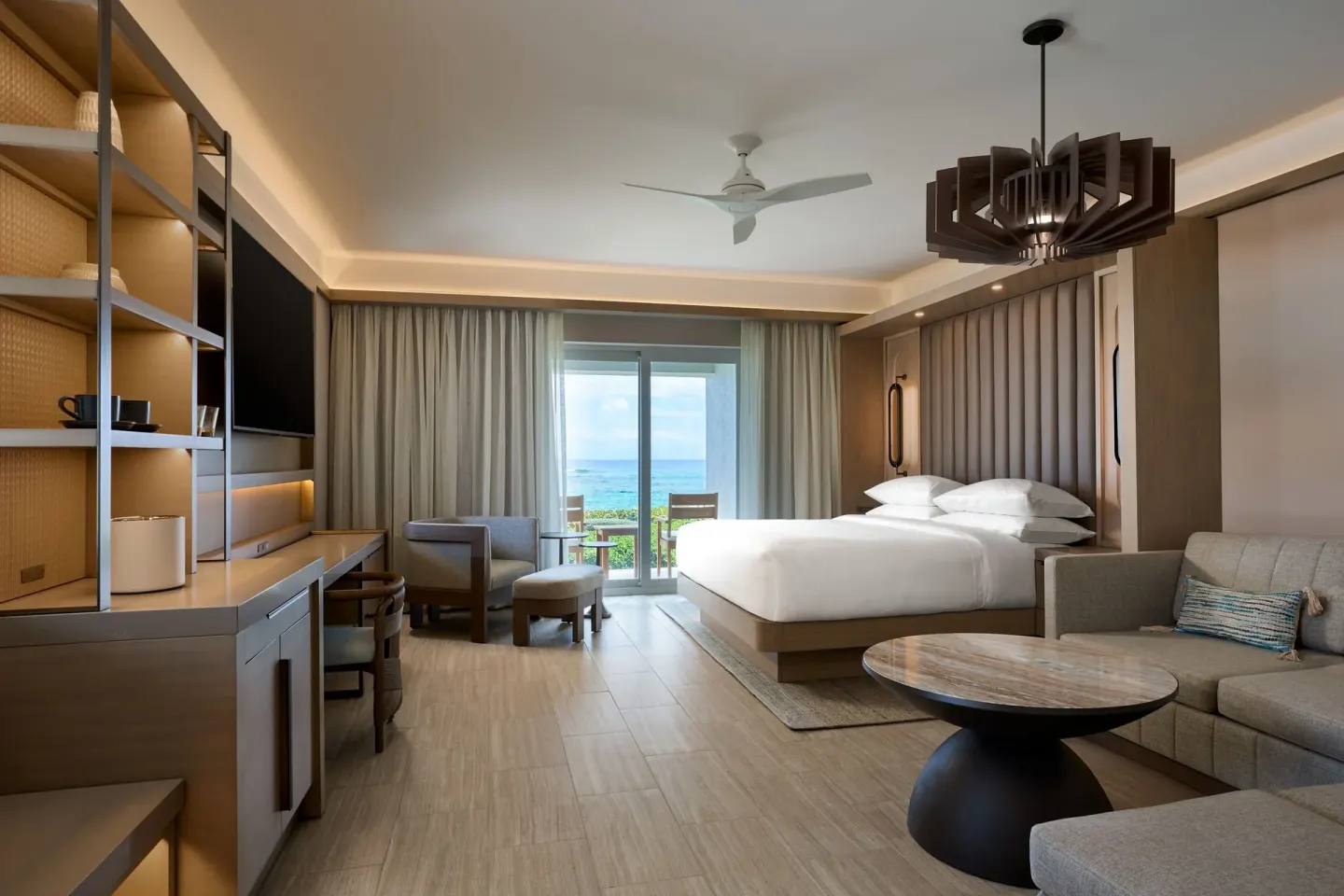 Deluxe ocean-view room with king bed and sofa bed at JW Marriott St. Maarten Beach Resort & Spa.