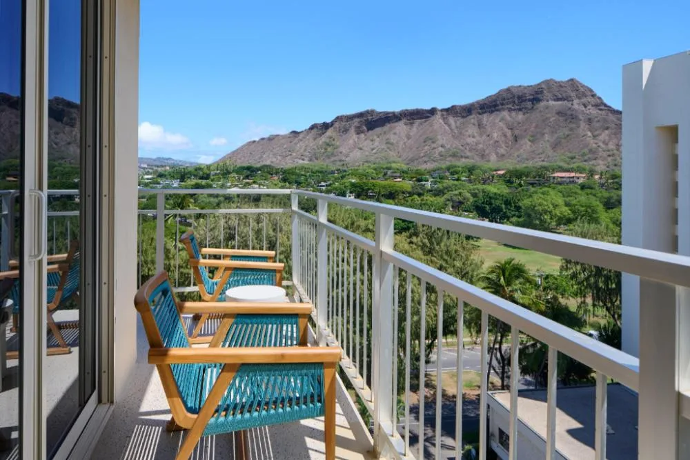 Diamond Head View Junior Suite balcony with mountain view at Kaimana Beach Hotel.