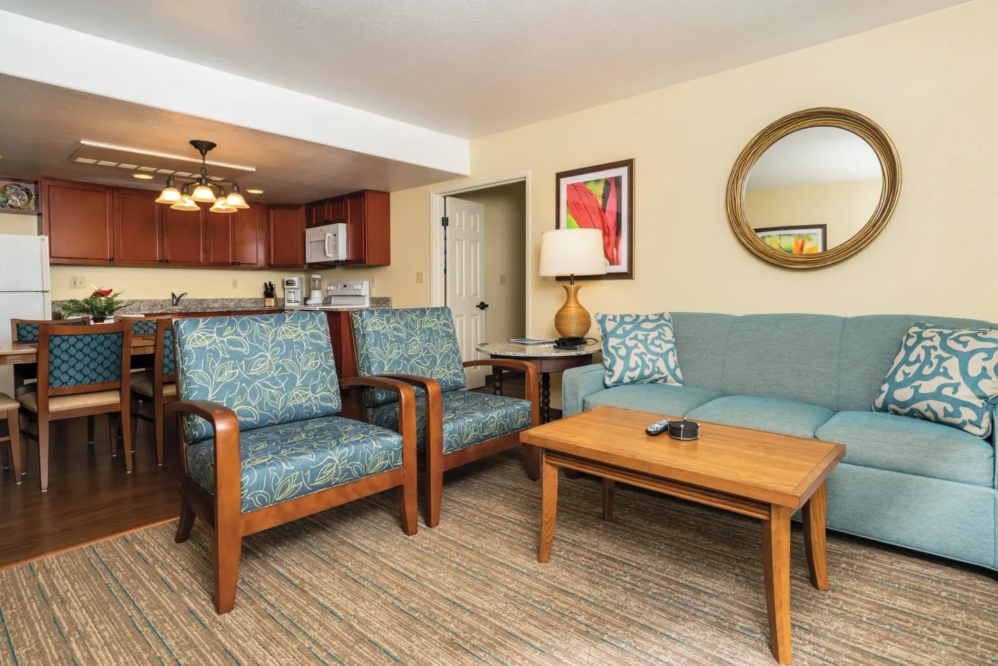 Living room and kitchen in the accessible ohana suite at Kauai Coast at the Beachboy.