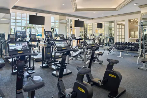 Exercise bikes, treadmills, weights and mirrors fill the gym at Kempinski Hotel Cancún.